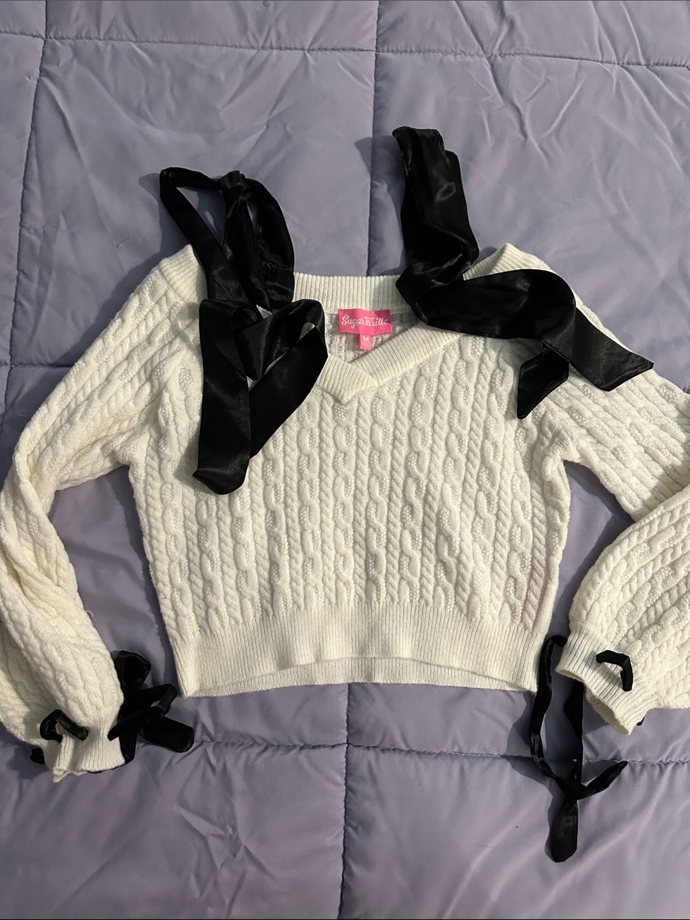 Sugar Thrillz White Cable Knit Off-Shoulder Sweater with Black Ribbon Ties